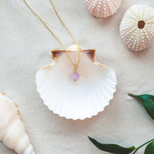 Load image into Gallery viewer, Stylish and minimalistic 42 cm long Kunzite necklace. Presented in a shell on a beach.